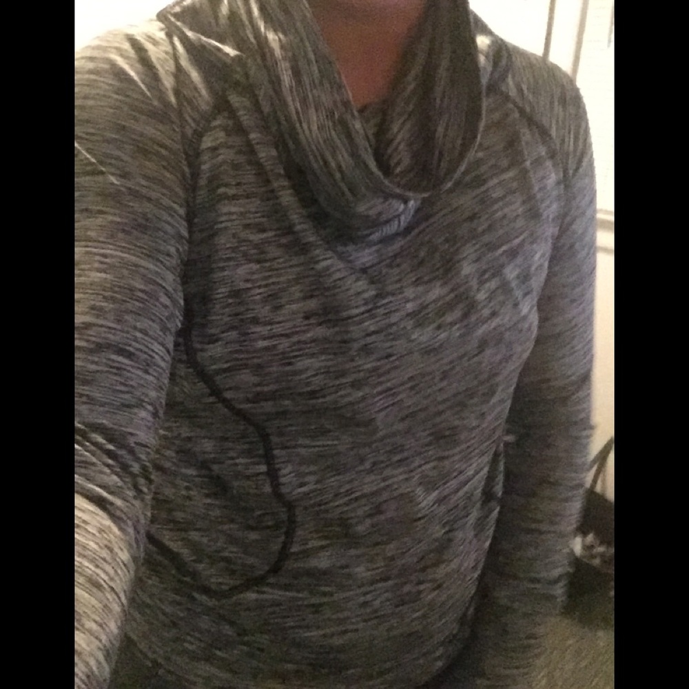 Size large athletic shirt fits like medium